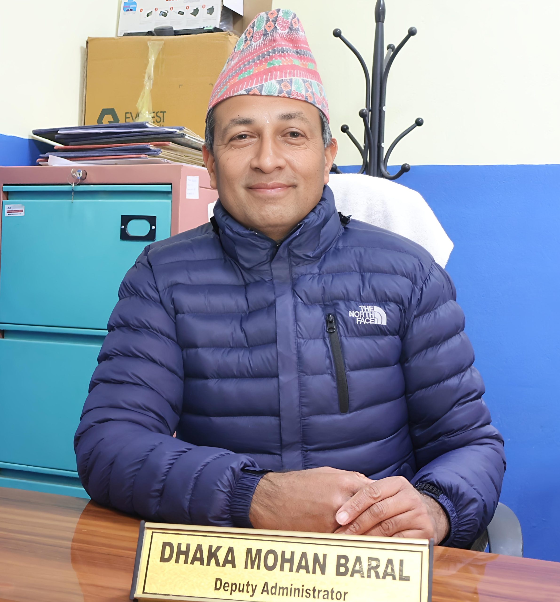 Mr. Dhaka Mohan Baral